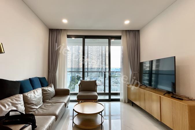 Sophisticated 2-bedroom haven with dual bathtubs and rich tones at Sunwah Pearl