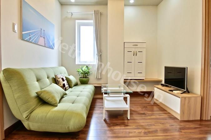 2 Bedrooms serviced apartment with warm interior design in District 1