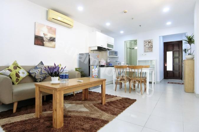 Spacious balcony with green life in serviced apartment in Binh Thanh District.